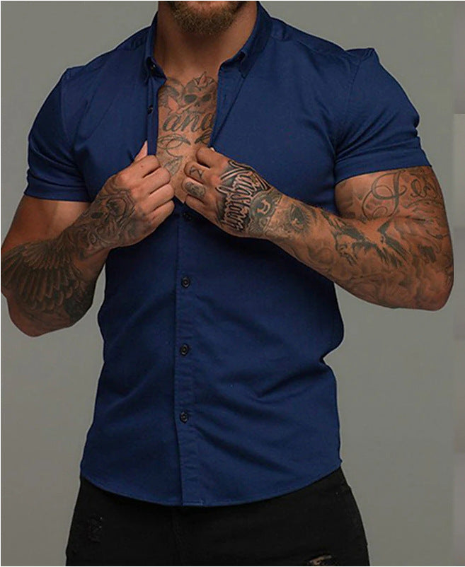 A muscular man in a solid-color lapel short-sleeved shirt